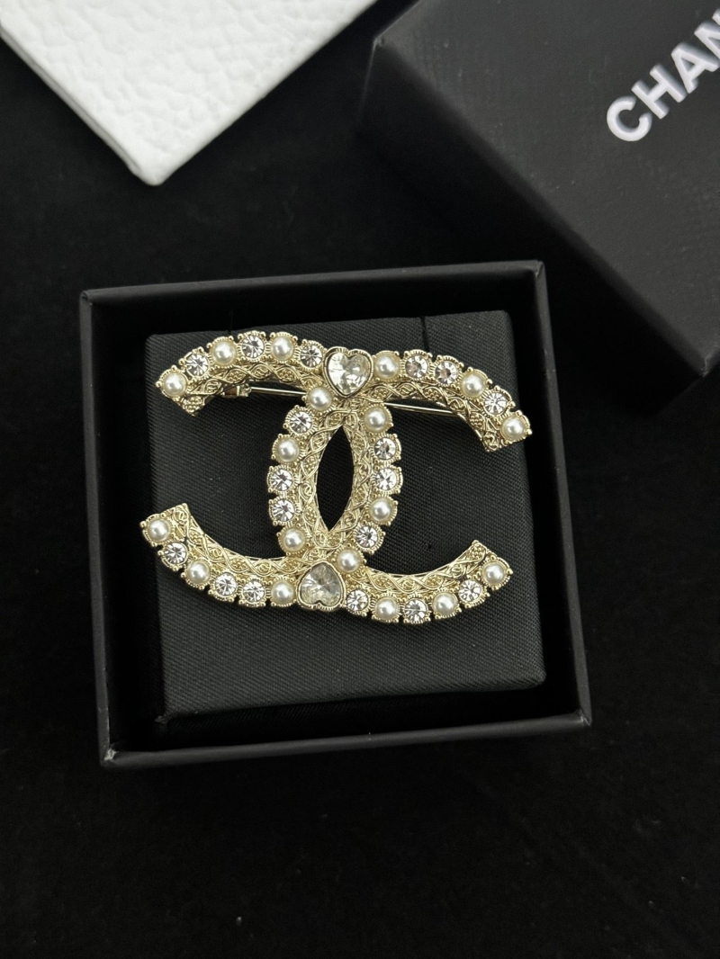Ch**el brooches